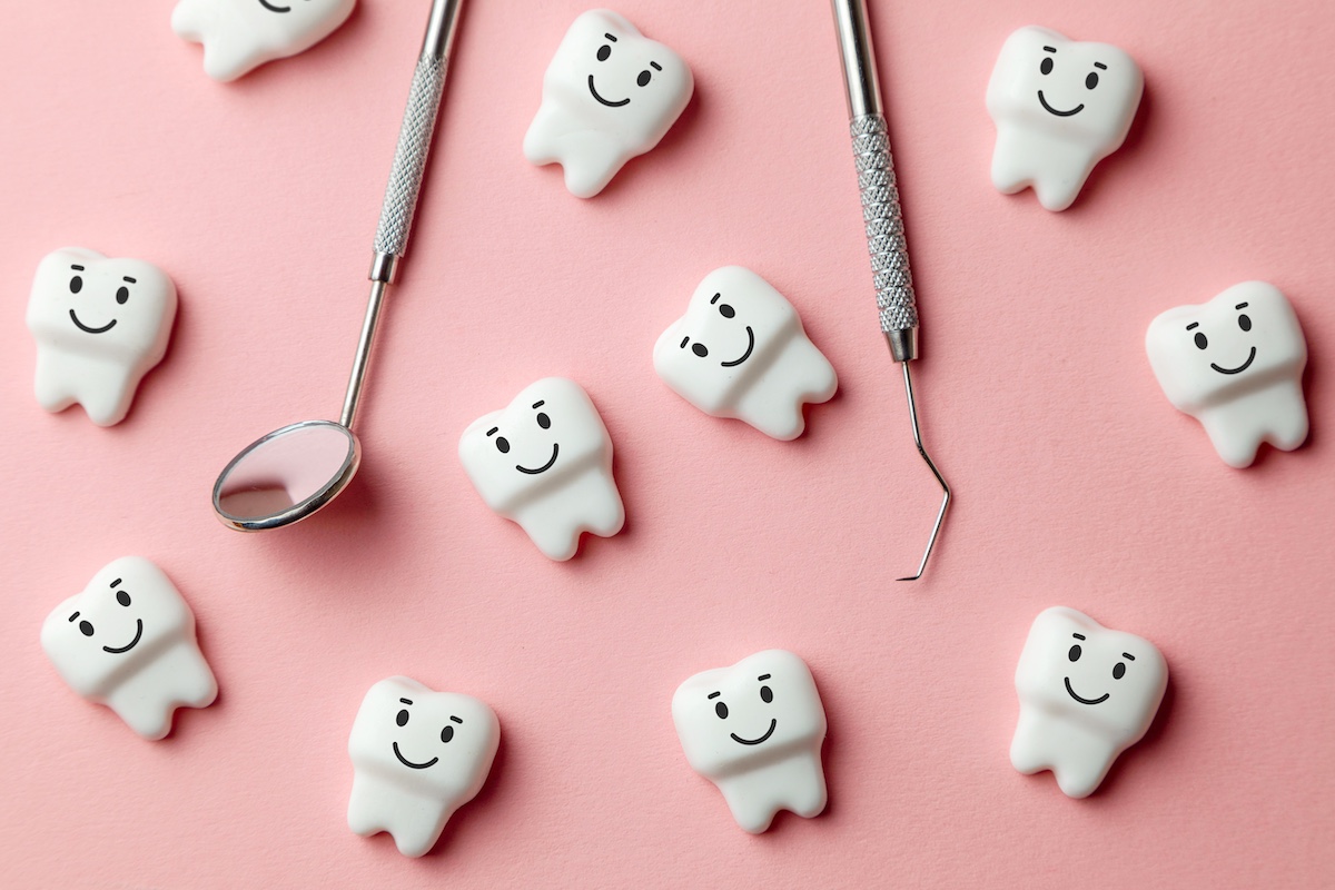happy teeth with instruments